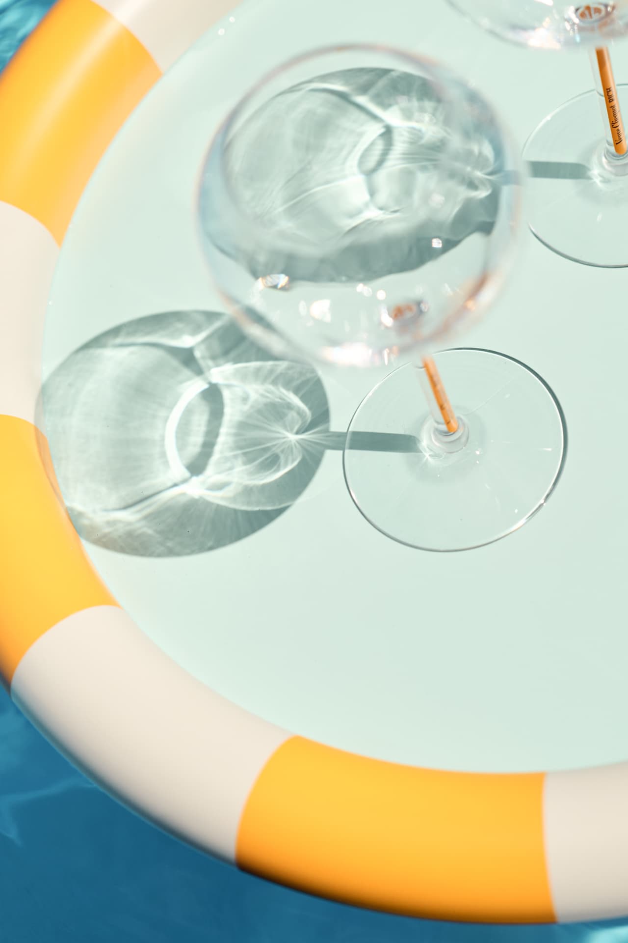 Glasses seen through water on a floating tray
