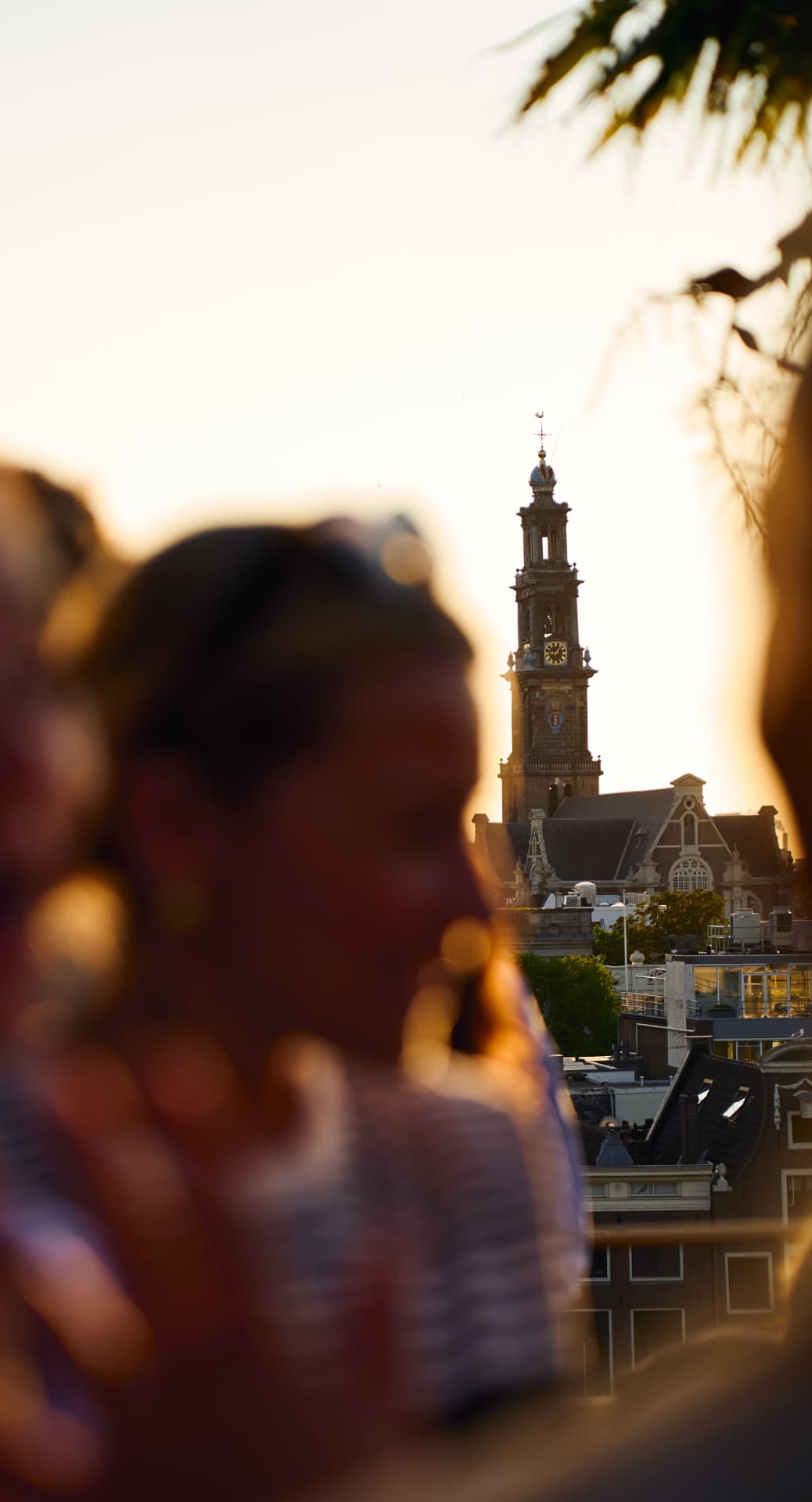 Church tower in focus behind the terrace