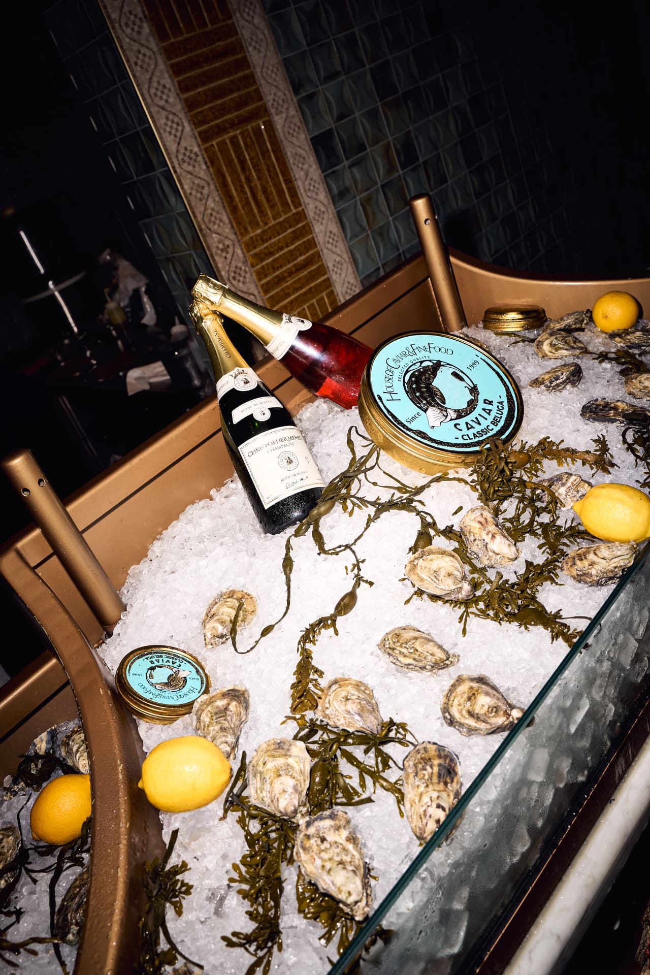 Oysters, champagne and caviar on ice