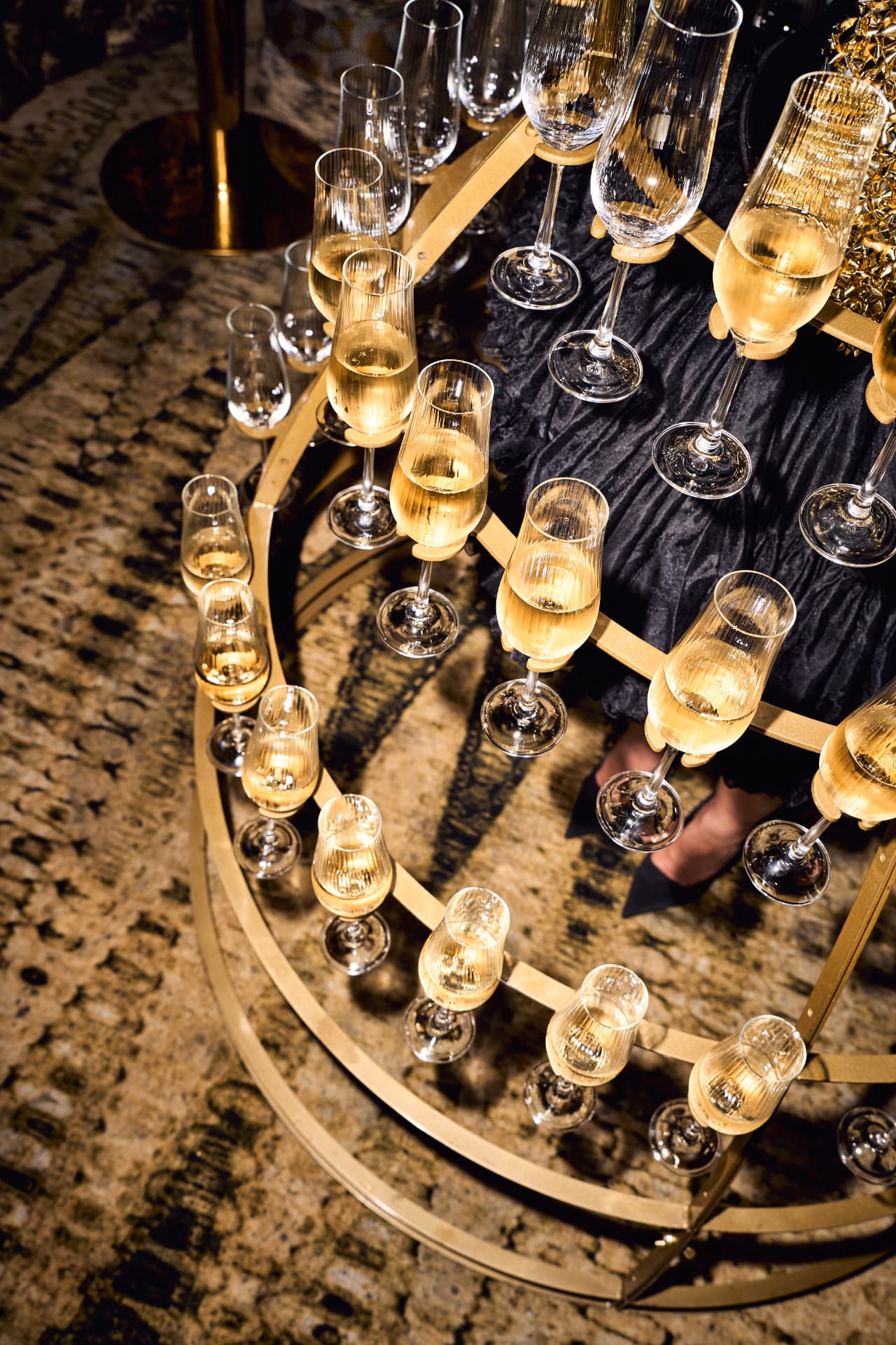 Tray of champagne glasses seen from above