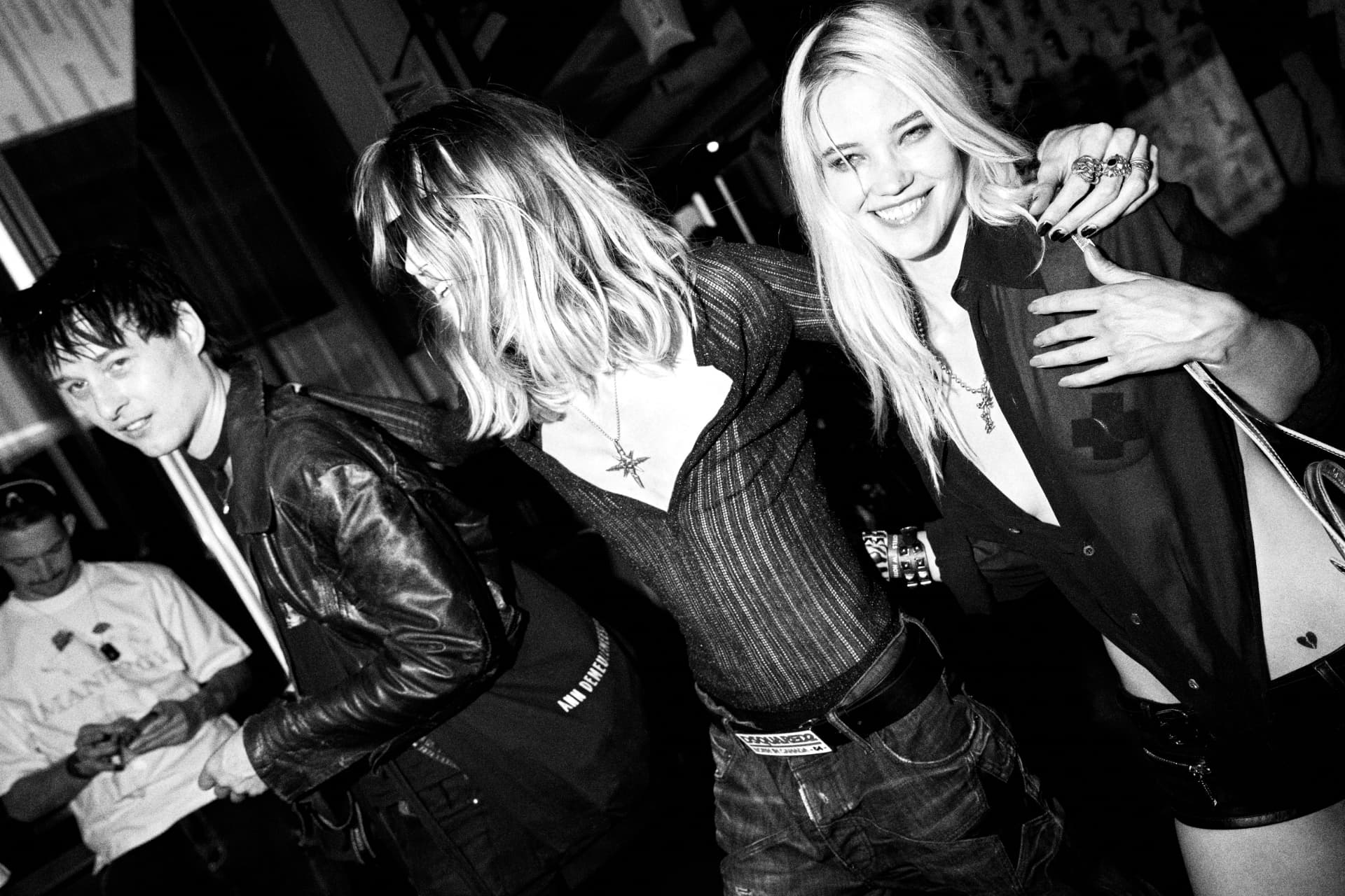 Guests dancing together in black and white