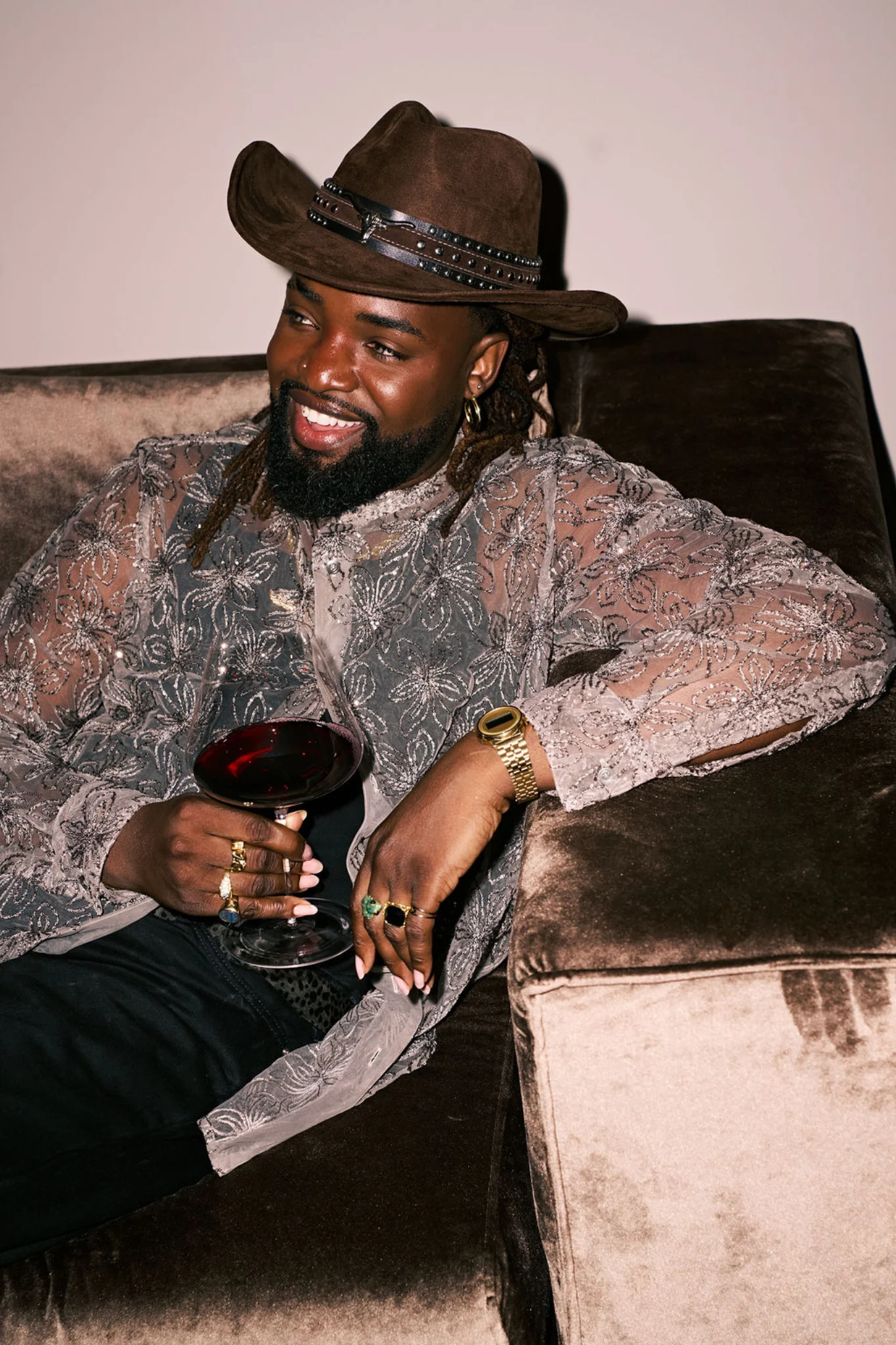 Seated portrait with a wine glass