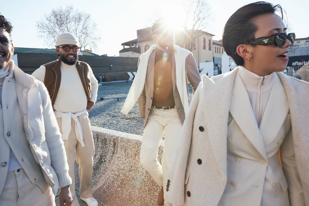 Group in winter tailoring in low afternoon sun