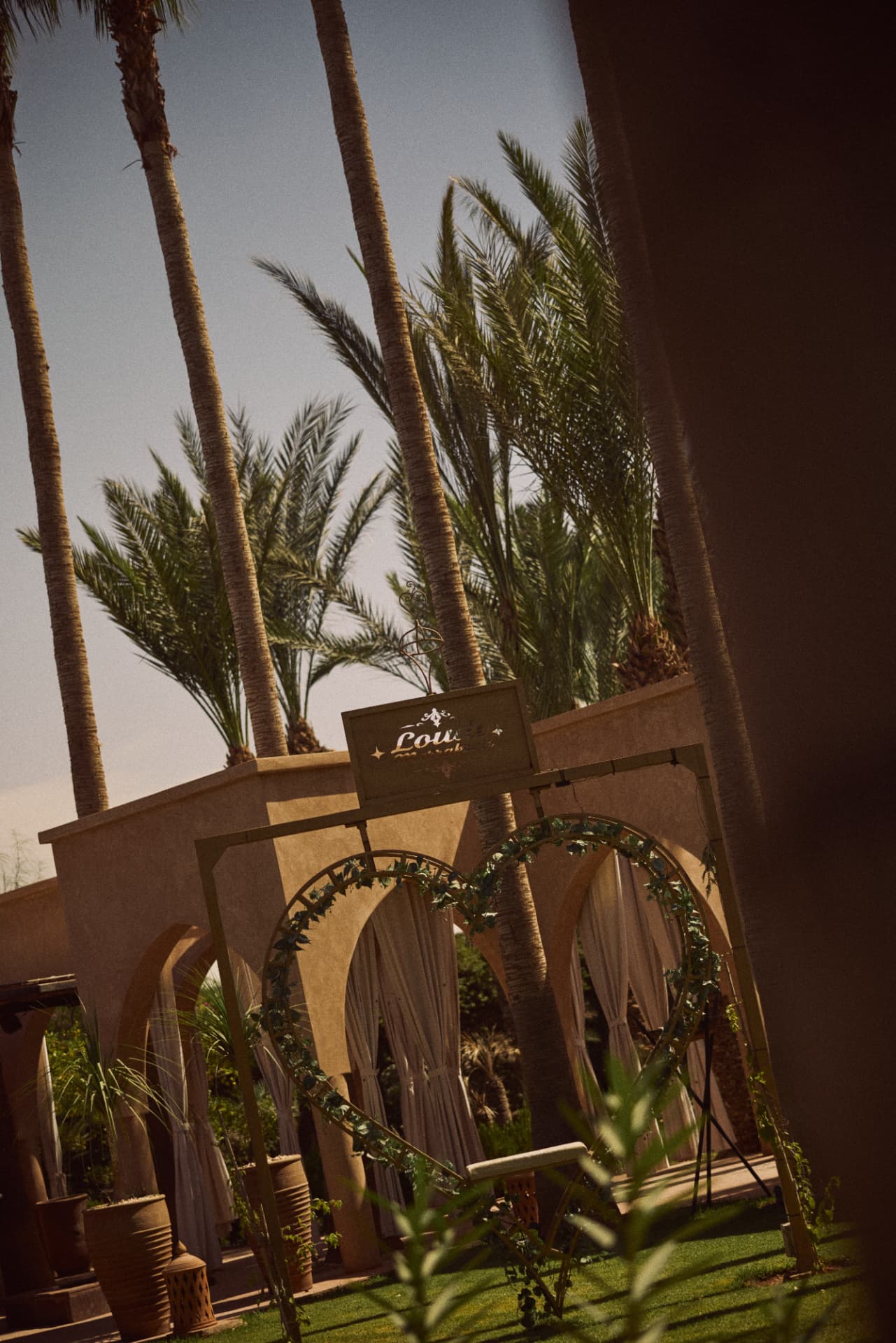 Garden pavilions with curtains and a heart-shaped arch