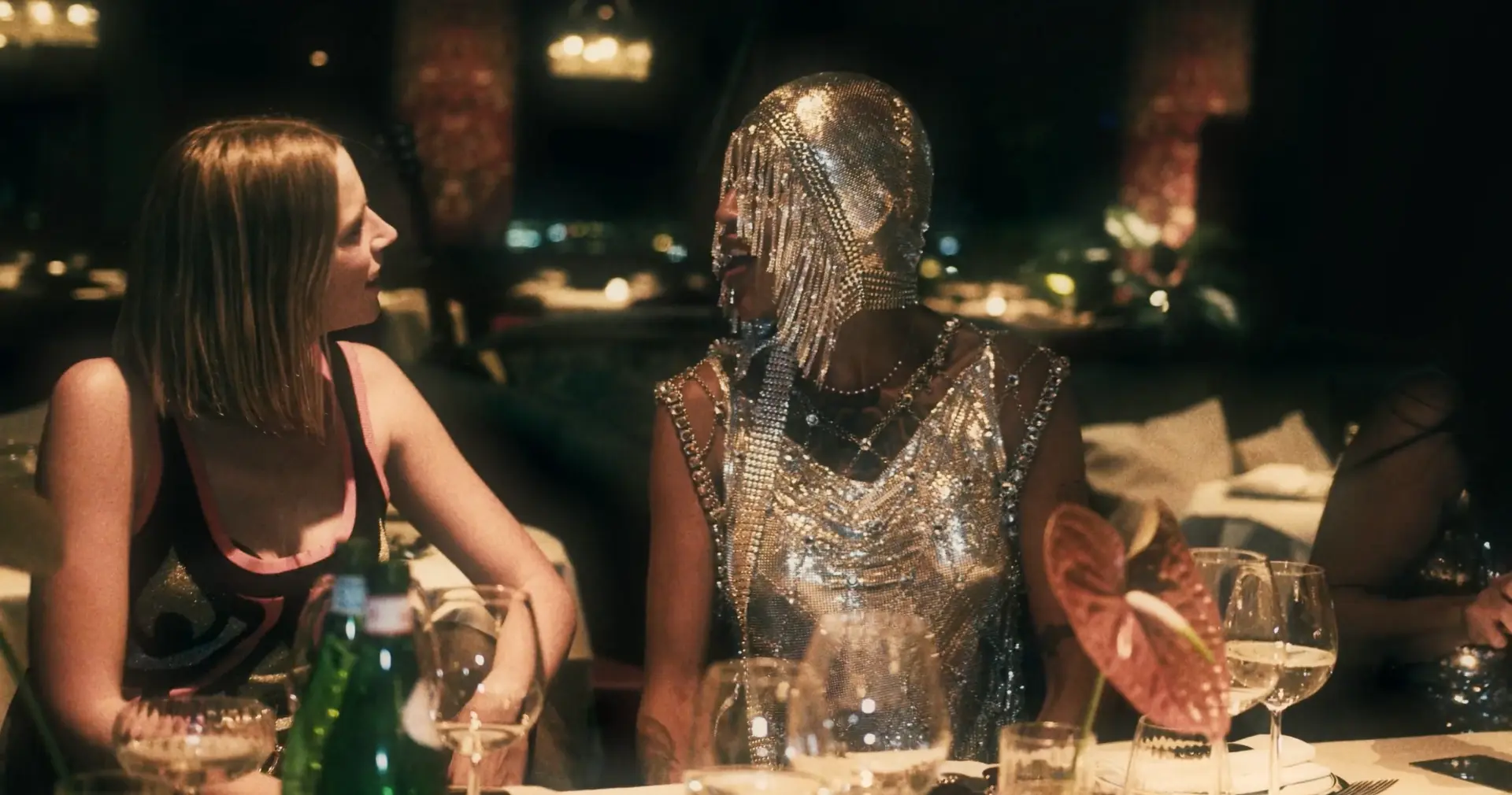 Metallic Rabanne look at the event dinner table
