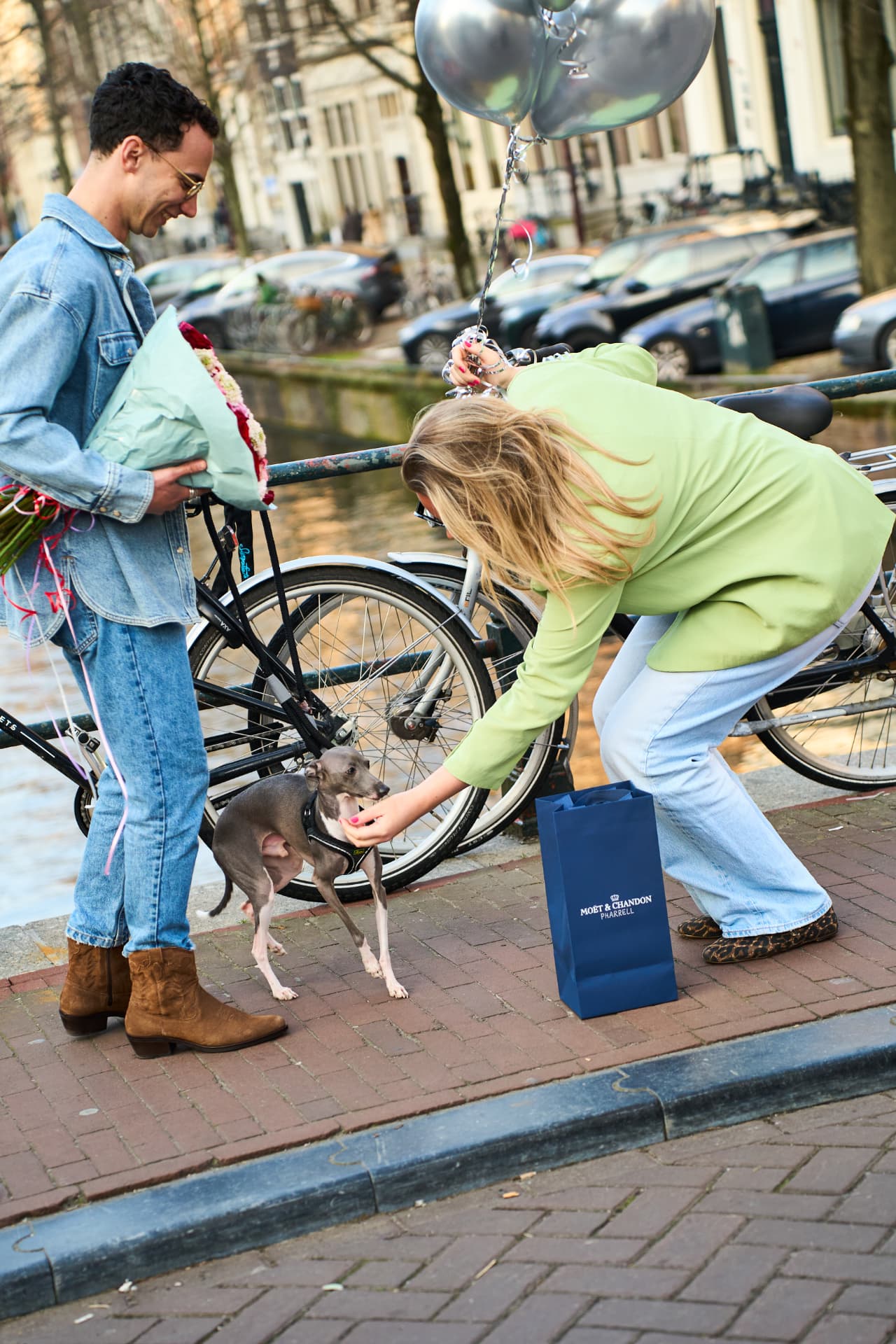 Delivery on the canal, greeting a whippet