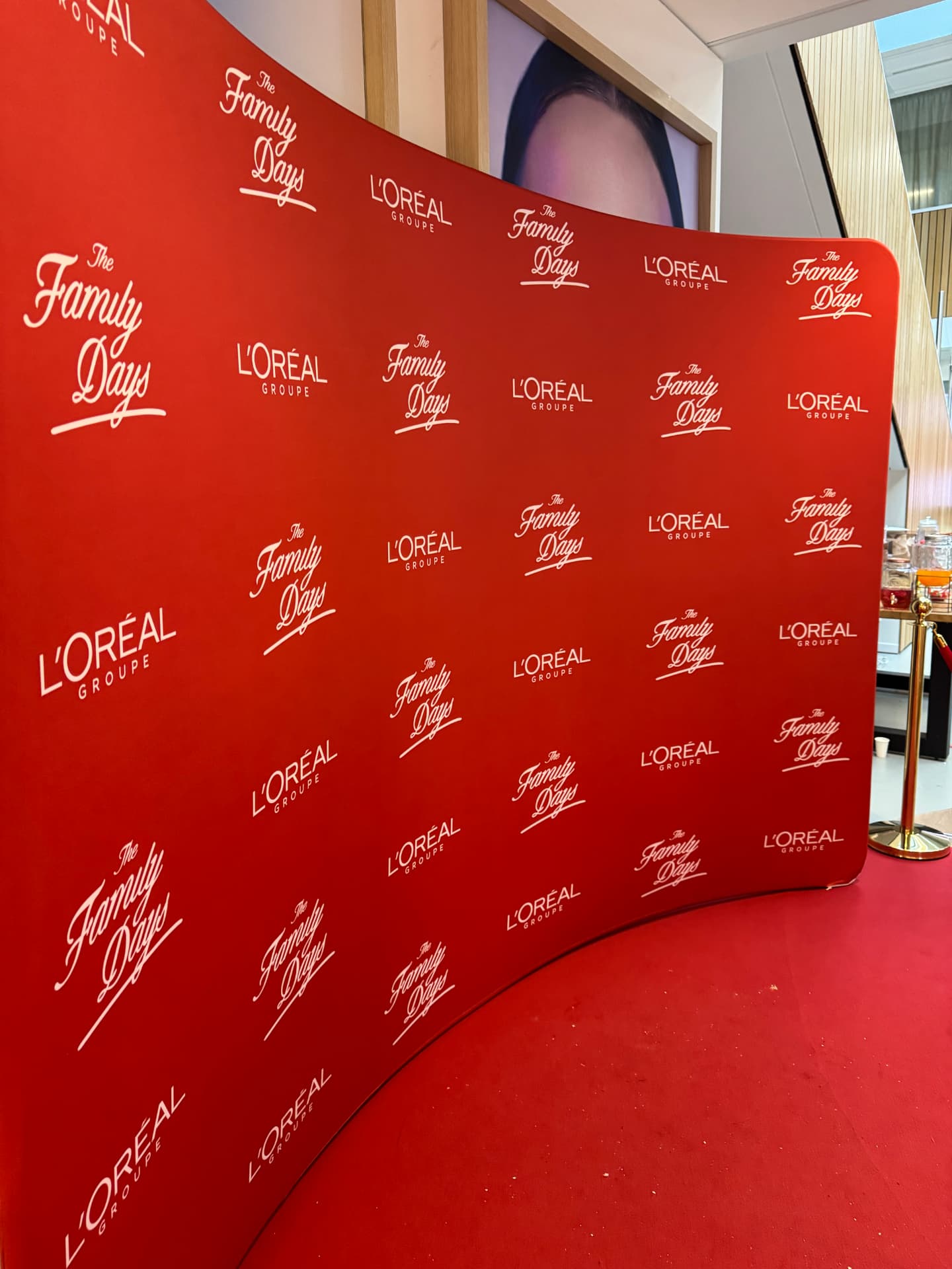Branded red backdrop for L’Oréal Groupe The Family Days
