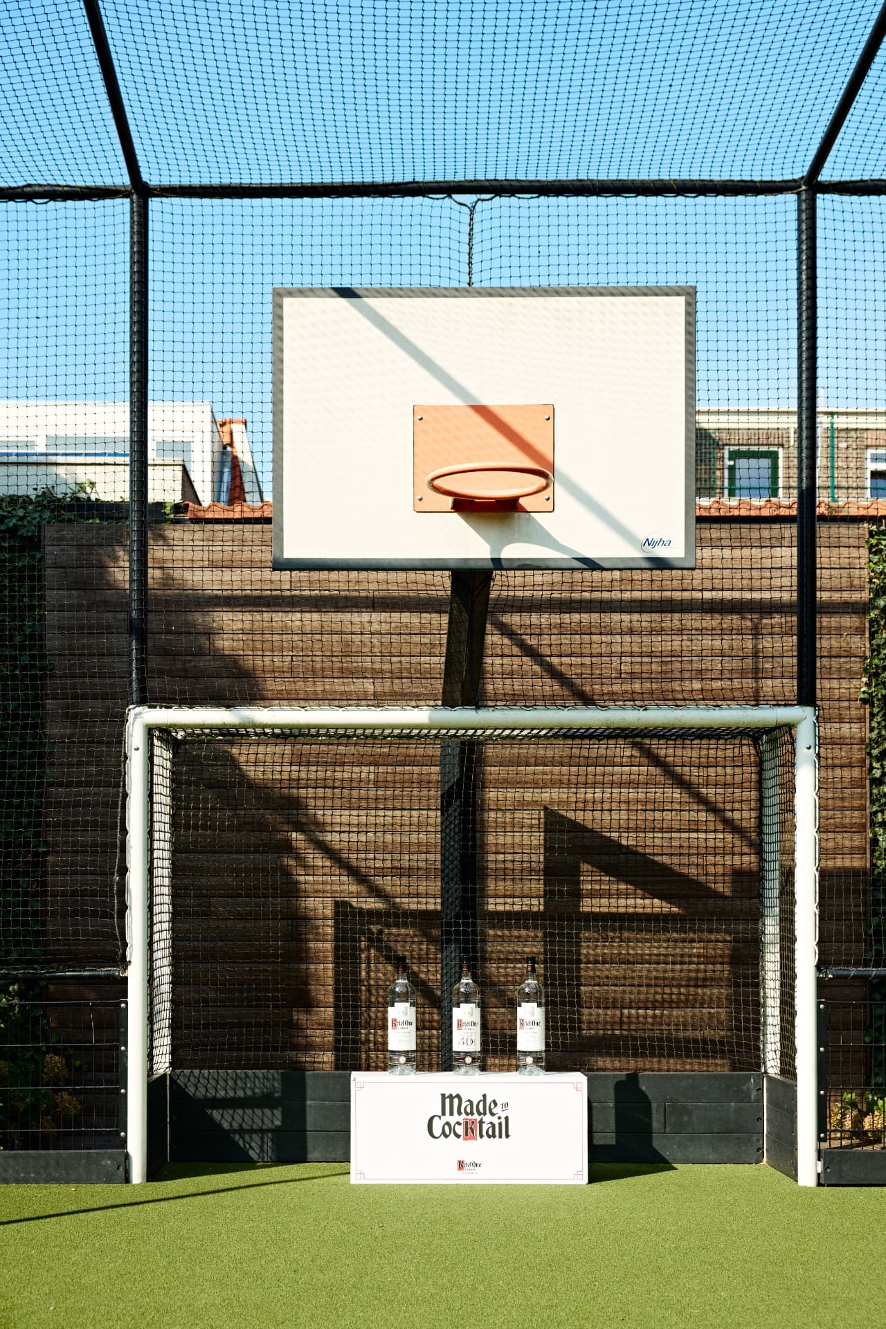 Ketel One setup on an outdoor basketball court
