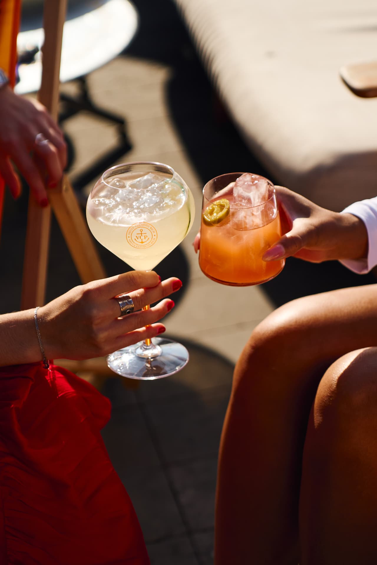 Two guests clinking glasses